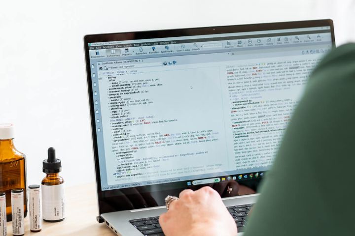 typing wellness plan on a laptop